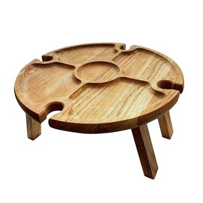 Eleganter Design-Holz-Aperitif-Tisch mit Pflanze